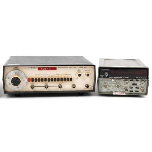 1460 - Four vintage electrical power supplies including Hewlett Packard 3311A function generator, Hewlett P... 