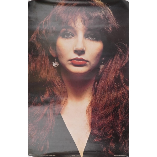 1277 - Kate Bush memorabilia comprising three posters, one framed and vintage badges, the largest 95cm x 72... 