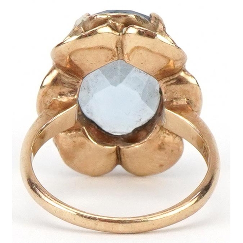 2130 - 9ct gold blue topaz flower head ring, the topaz approximately 16.20mm x 12.60mm x 7.0mm deep, size N... 