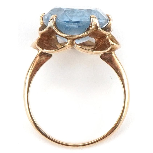 2130 - 9ct gold blue topaz flower head ring, the topaz approximately 16.20mm x 12.60mm x 7.0mm deep, size N... 