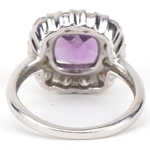 2010 - 9ct white gold amethyst and diamond cluster ring, total diamond weight approximately 1.00 carat, siz... 