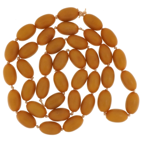 Vintage amber coloured bakelite bead necklace, 96cm in length, 118.5g