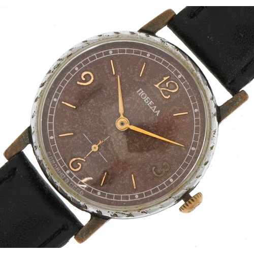 Russian USSR manual wind wristwatch having Arabic numerals, the case numbered 727846, 34mm in diameter