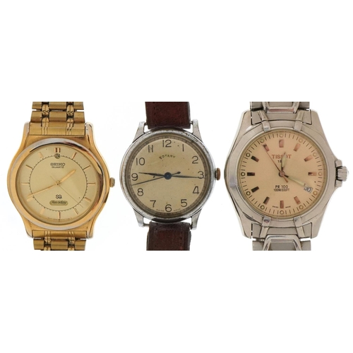 2717 - Three vintage and later gentlemen's wristwatches comprising Rotary, Tissot PR100 and Seiko, the larg... 