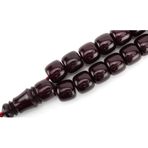 2714 - Turkish cherry amber coloured Tasbih prayer bead necklace, 48cm in length, 100.5g