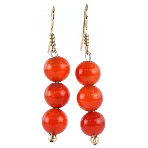 2446 - Pair of 9ct gold carnelian bead drop earrings, each 4.5cm high, total 6.0