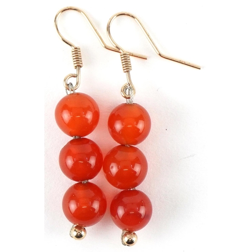 2446 - Pair of 9ct gold carnelian bead drop earrings, each 4.5cm high, total 6.0