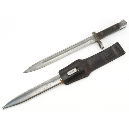 Military interest bayonet with scabbard and leather frog, various impressed marks, 40cm in length