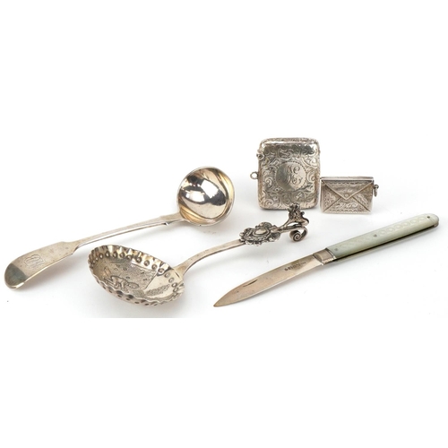 337 - Victorian and later silver comprising a Dutch silver caddy spoon embossed with a figure and child, l... 