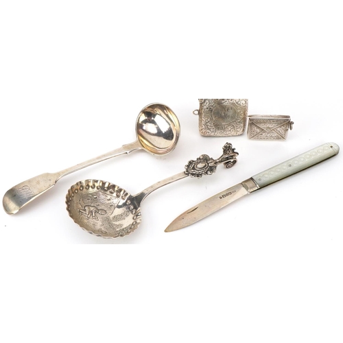 337 - Victorian and later silver comprising a Dutch silver caddy spoon embossed with a figure and child, l... 