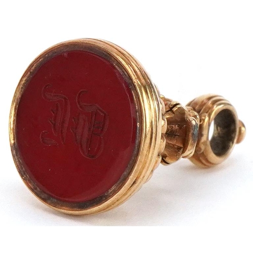 2243 - Victorian unmarked gold intaglio seal fob with engraved carnelian matrix, tests as 15ct gold, 3cm hi... 