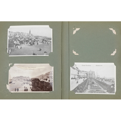 675 - Early 20th century and later postcards arranged in an album, some real photographic, including Croyd... 