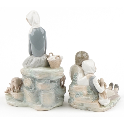 1164 - Two Lladro figure groups with boxes comprising  Figurine Precocious 4856 and girl with piglets 4572,... 