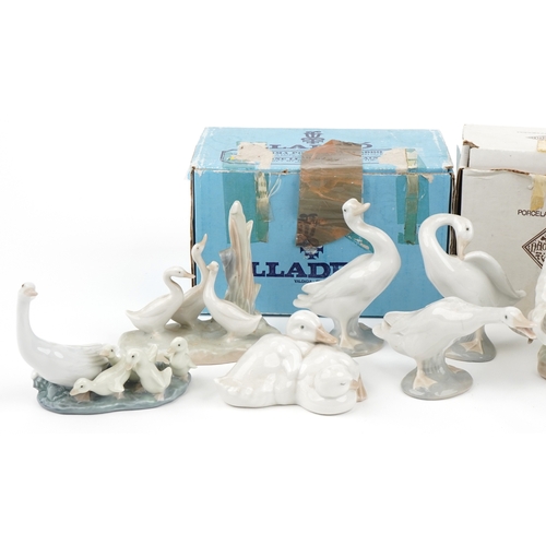 1180 - Nine Lladro and Nao figures, animals and groups including two polar bears and a boy with ram, the la... 