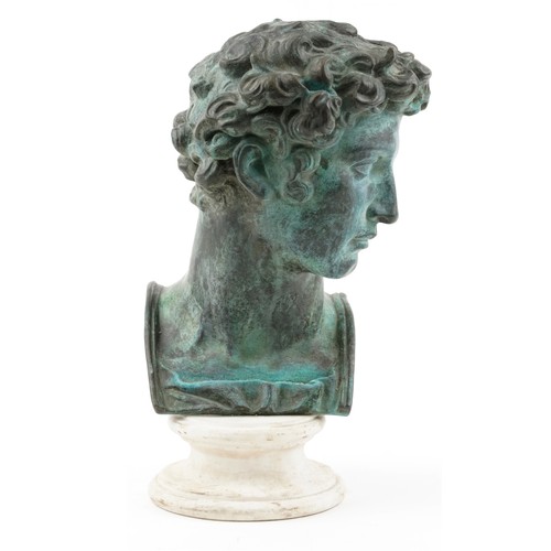 DONE K xxxxx check list ?After the Antique, patinated bronze head of David of Michelangelo raised on a circular white alabaster base, 52cm high