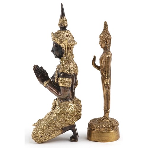 1390 - Two Thai gilt metal figures of Buddha including a kneeling example, the largest 12cm high