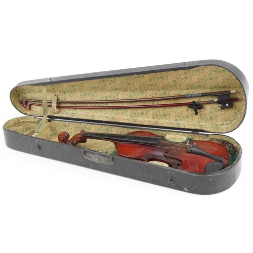 1239 - Old wooden violin with two bows housed in a hardwood case, the violin back 13 inches in length
