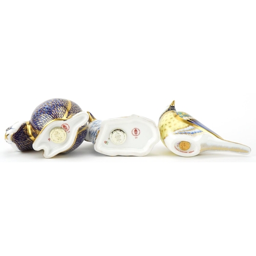 1169 - Royal Crown Derby Great Tit, Lamb and Badger paperweights with gold stoppers, the largest 11cm in le... 