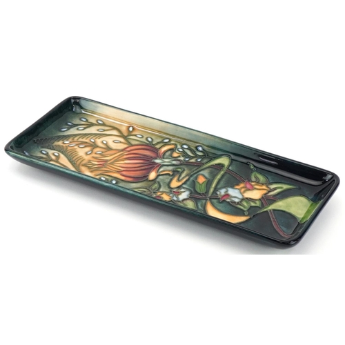 104 - Moorcroft pottery rectangular dish hand painted and tubelined with stylised flowers, dated 2001, 20c... 