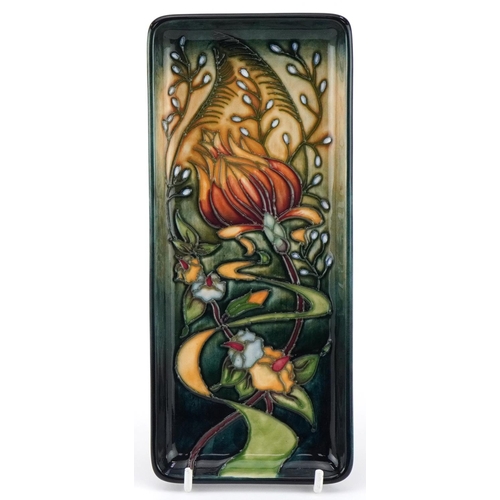 104 - Moorcroft pottery rectangular dish hand painted and tubelined with stylised flowers, dated 2001, 20c... 