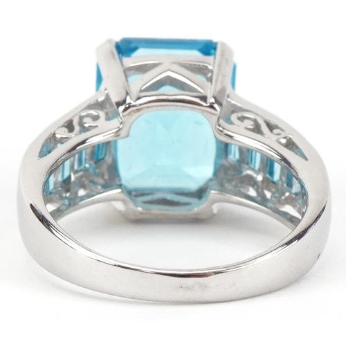 2341 - 9ct white gold blue topaz ring, set with blue stones to the shoulders, the topaz approximately 11.80... 