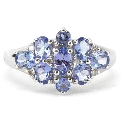 2374 - 9ct white gold purple stone and diamond flower head cluster ring, size M, 2.8g