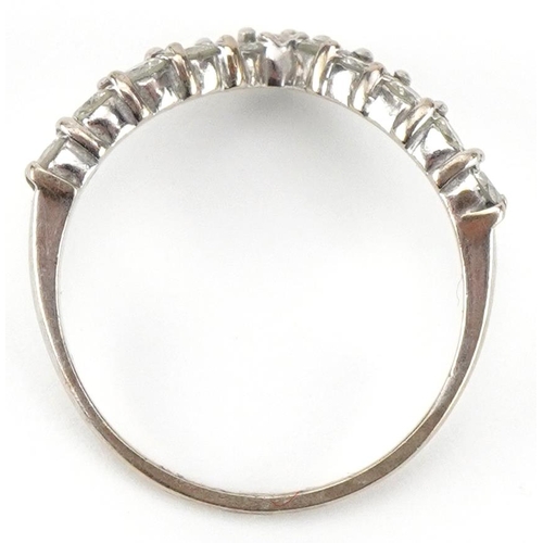 2043 - 18ct white gold diamond wishbone ring, each diamond approximately 2.35mm in diameter, size M, 2.4g