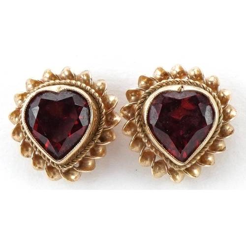 2211 - Pair of 9ct gold garnet love heart stud earrings, each 9.5mm high, total 1.8g