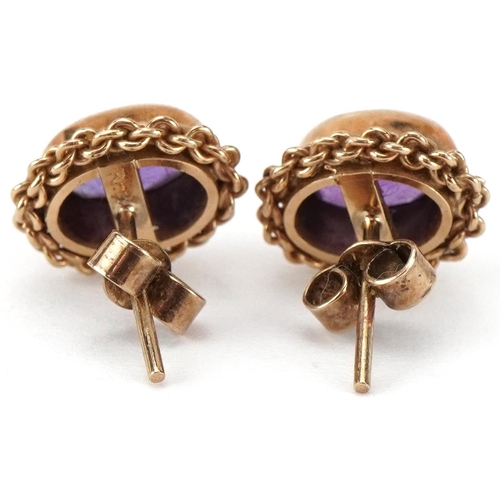 2358 - Pair of 9ct gold amethyst stud earrings, each 1.1cm high, total 2.0g