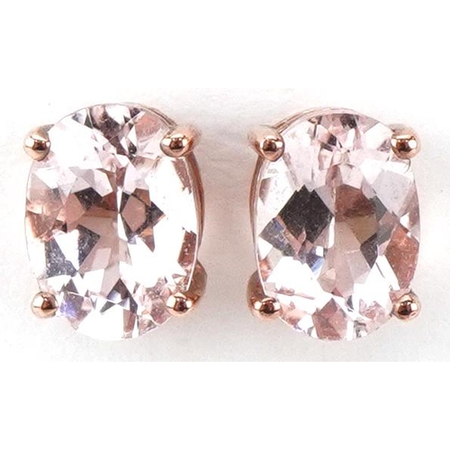 2335 - Pair of 9ct rose gold pink stone stud earrings, each 7mm high, total 1.1g