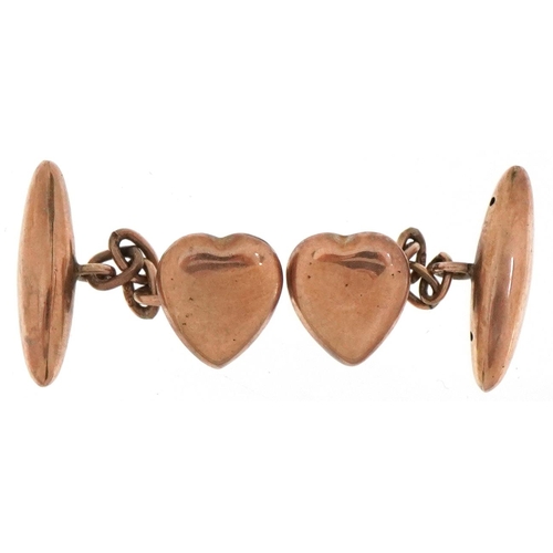 2199 - Pair of Victorian 9ct rose gold cufflinks in the form of love hearts, Birmingham 1900, each 2cm in l... 