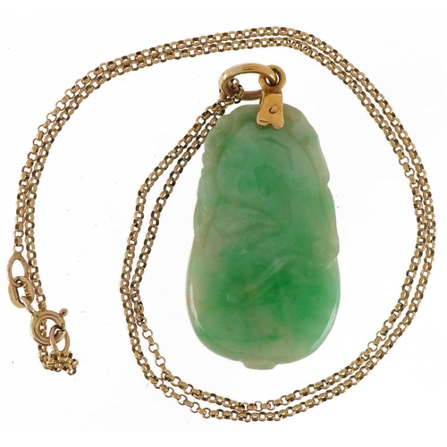 2314 - Chinese carved green jade pendant in the form of fruit with unmarked gold mount on a 9ct gold neckla... 