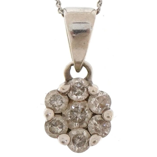 2037 - 9ct white gold diamond flower head pendant on a 9ct white gold necklace, total diamond weight approx... 