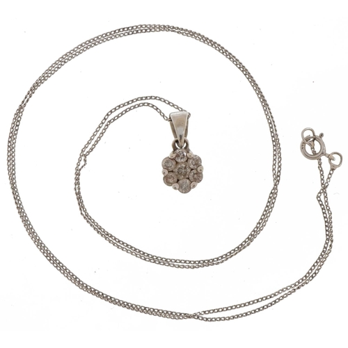 2037 - 9ct white gold diamond flower head pendant on a 9ct white gold necklace, total diamond weight approx... 