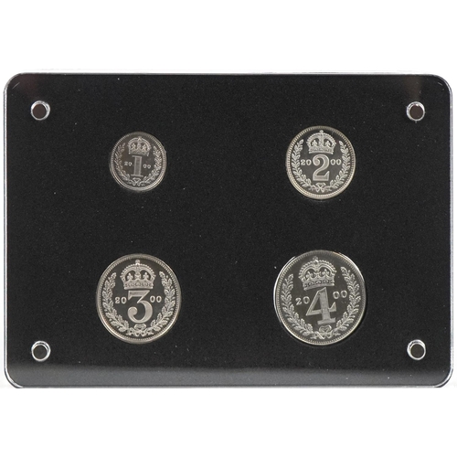 644A - Elizabeth II 2000 maundy coin set housed in a Perspex case with box and certificate by The London Mi... 