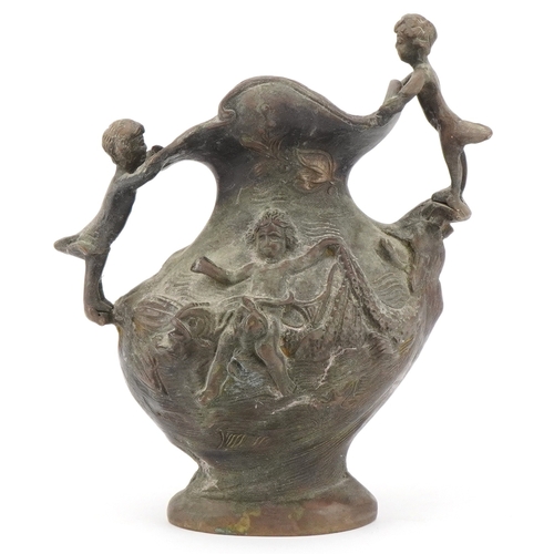 1299 - 19th century classical patinated bronze jug surmounted and decorated in relief with children and fis... 