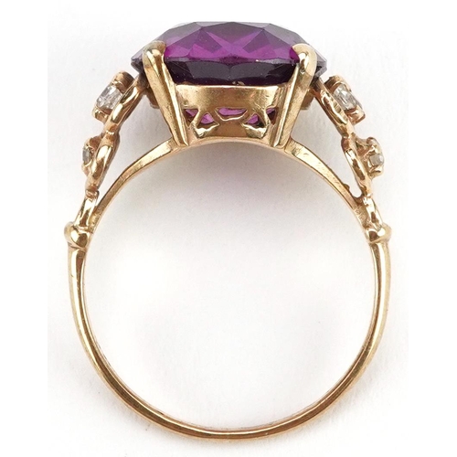 2378 - 9ct gold pink stone solitaire ring with clear stone set shoulders, the pink stone tests as sapphire ... 