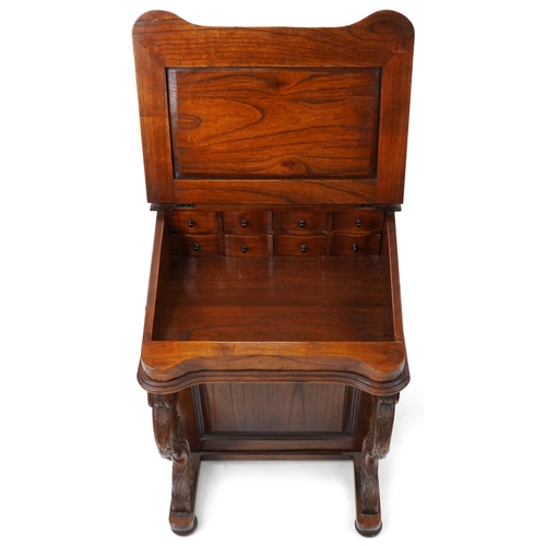 1055 - Stained hardwood Davenport with tooled leather top, fitted interior and four side drawers opposing f... 