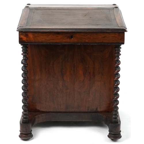 1064 - Rosewood and mahogany Davenport with lift up slope and four side drawers opposing four dummy drawers... 