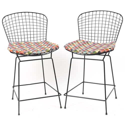Harry Bertoia, manner of Knoll, pair of metal barstools with cushioned seats, each 99cm high