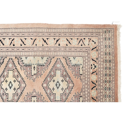 1125 - Middle Eastern beige ground rug having an allover floral design, 166cm x 97cm