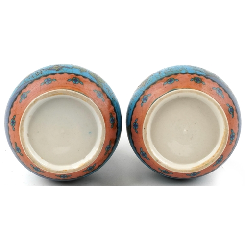 1296 - Pair of Japanese Owari shippo porcelain vases enamelled with flowers, each 19cm high