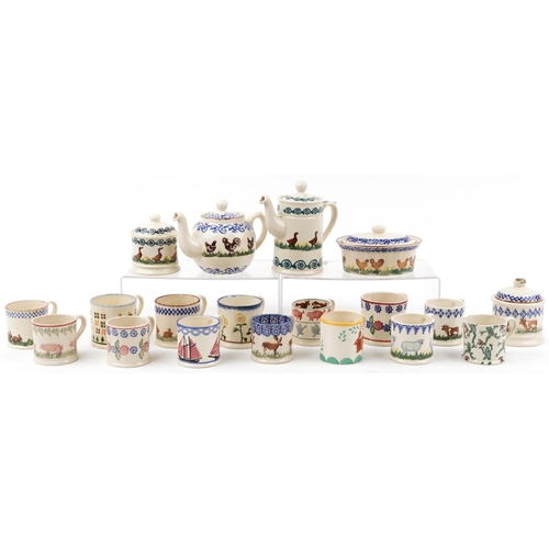 1366 - Brixton pottery hand painted with animals including mugs, storage jars and teapot, the largest 21.5c... 