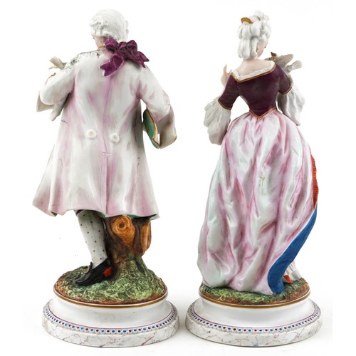 73 - Pair of large 19th century French bisque porcelain figures of bird catchers, impressed AM factory ma... 