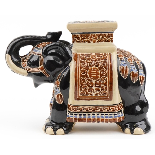 1288 - Chinese pottery garden seat in the form of an elephant, 58cm in length