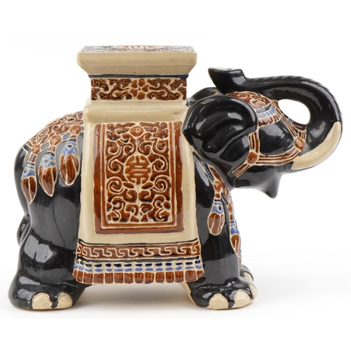 1288 - Chinese pottery garden seat in the form of an elephant, 58cm in length