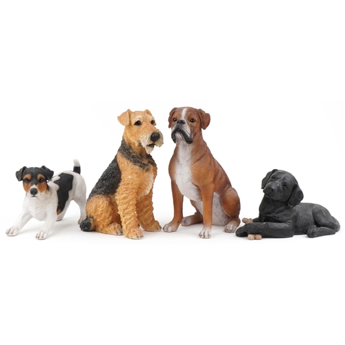 1292 - Four large decorative model dogs including Sandicast Labrador pup and Hotant Jack Russell 46cms high