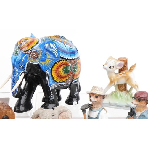 1360 - Model animals including carved hardwood elephant and two novelty frogs together with a hardwood carv... 