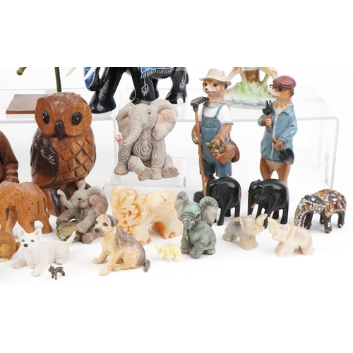 1360 - Model animals including carved hardwood elephant and two novelty frogs together with a hardwood carv... 