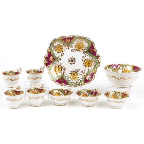 77 - Victorian teaware hand painted and gilded with flowers, seven cups, slop bowl and side plate, the la... 